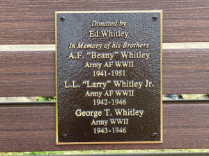 close up of dedication of memorial bench